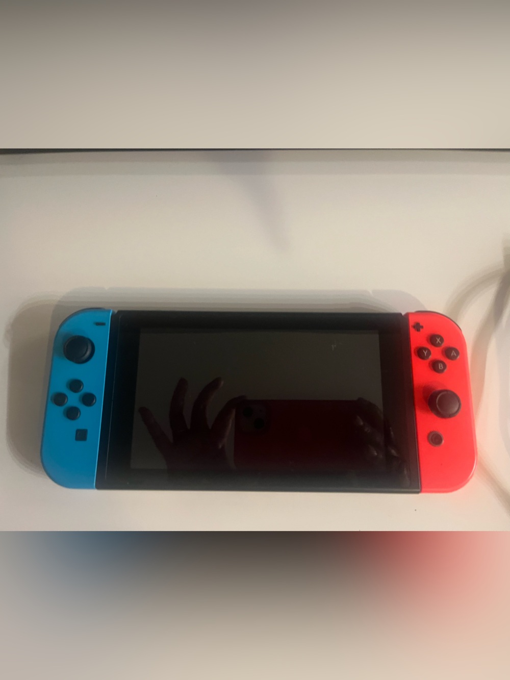 Nintendo switch Console with Blue and Red Joy-Con Controllers